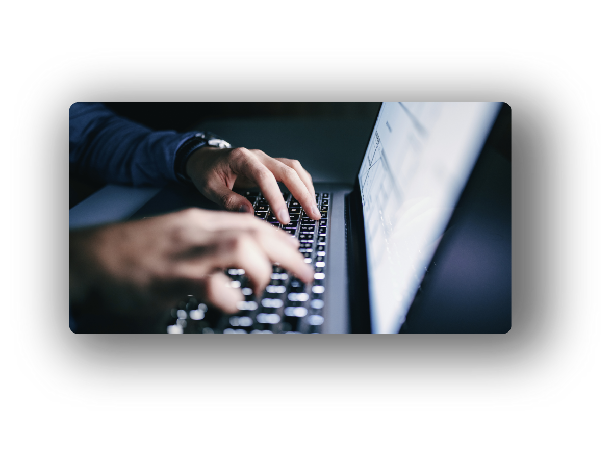 Person typing on laptop - cybersecurity concept